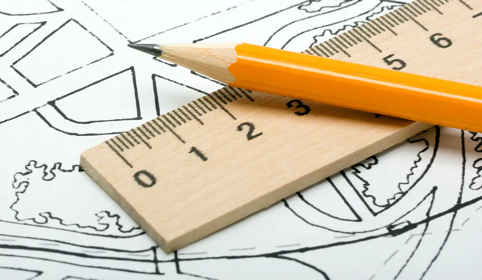 Close up of a drawing with a pencil and ruler